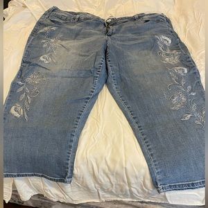 Light denim, distressed crop with floral embroidery down legs